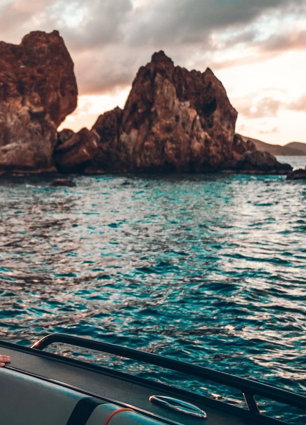 Sunset over the water and rock islets from the boat, Virgin Islands